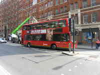 London, April 13-15th 2007: Meeting Sun Lim. That's a bus... and Sun waiting to cross the street.
